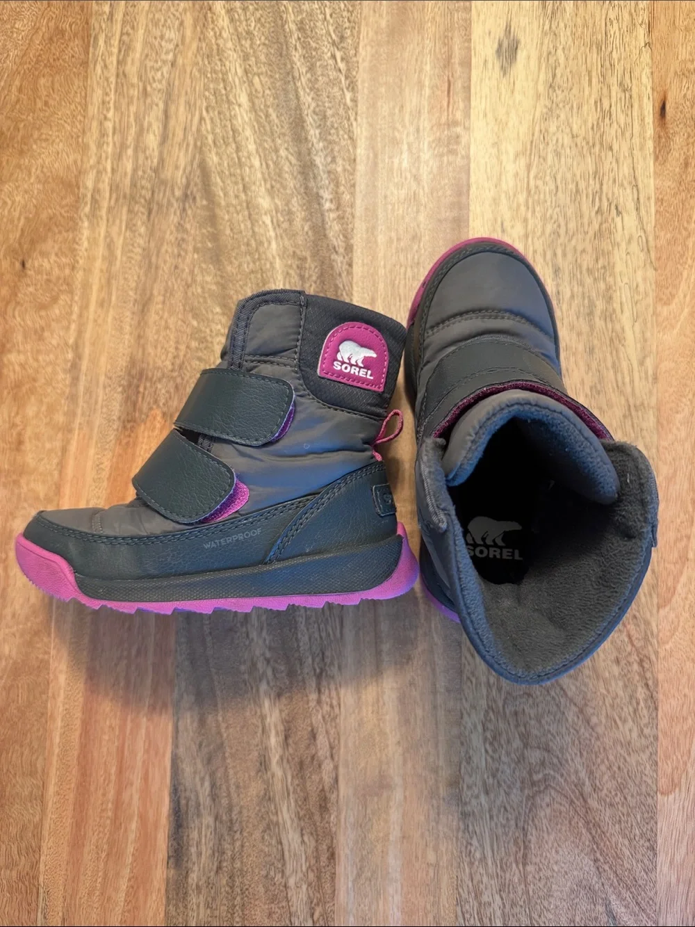 Sorel Kids Black Winter Boots with Pink Soles